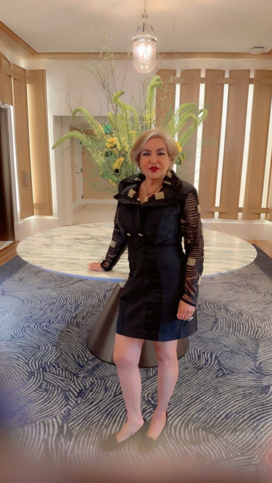 Veronica Medellin in luxury foyer