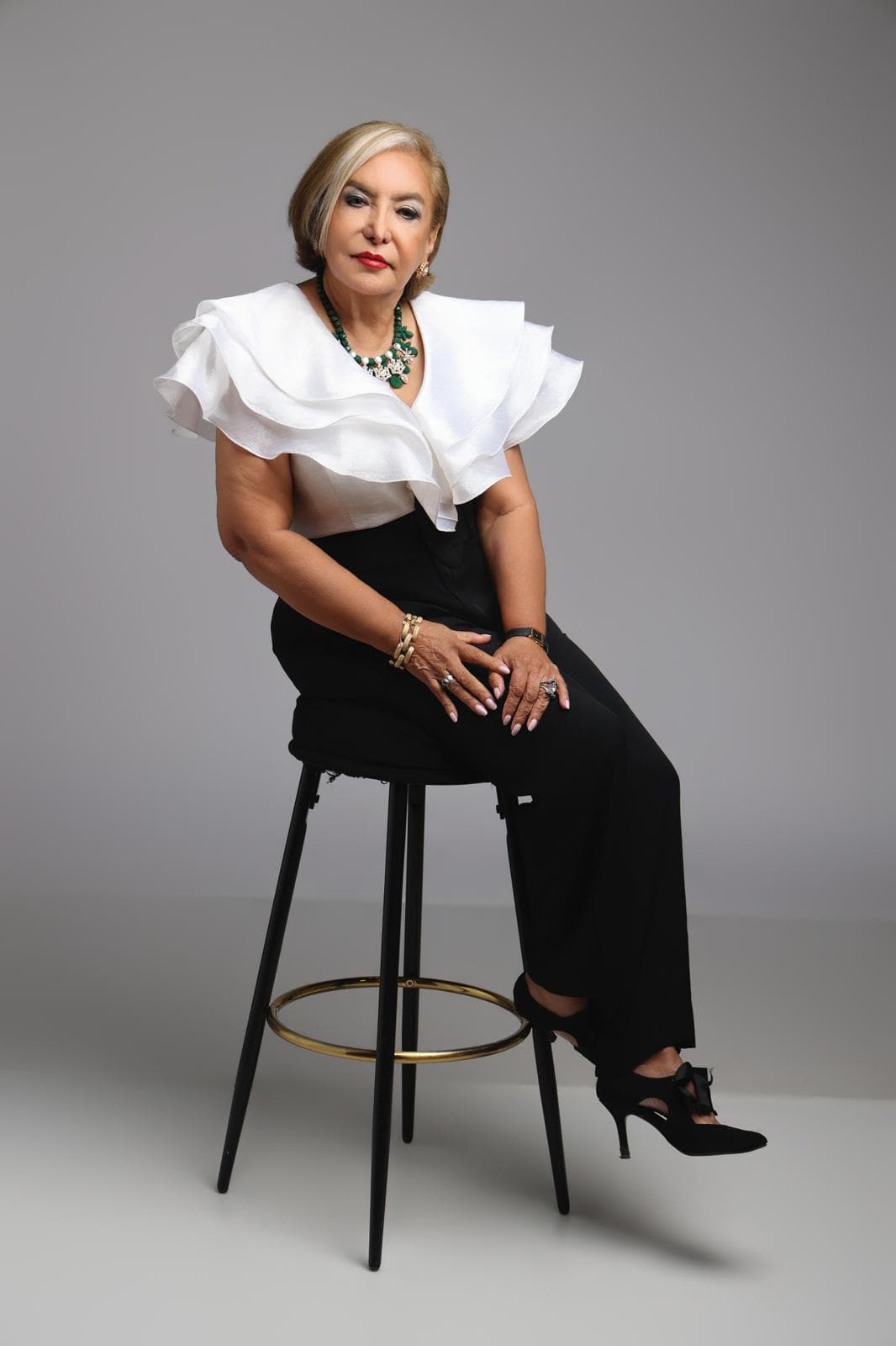 Veronica Medellin seated studio portrait